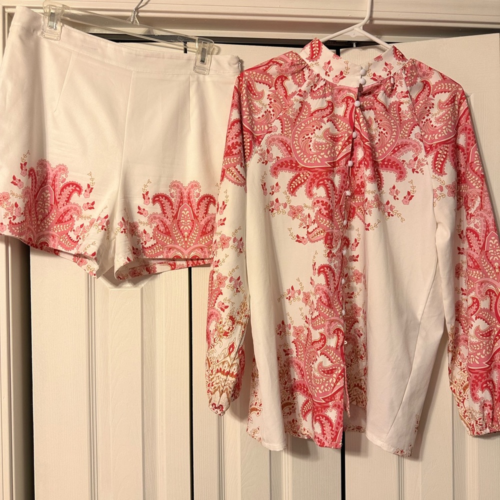 Beautiful shirt set. White with pink designs  gorgeous round white buttons.